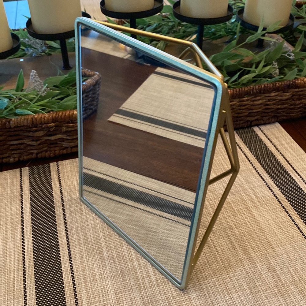 Geometric gold freestanding mirror